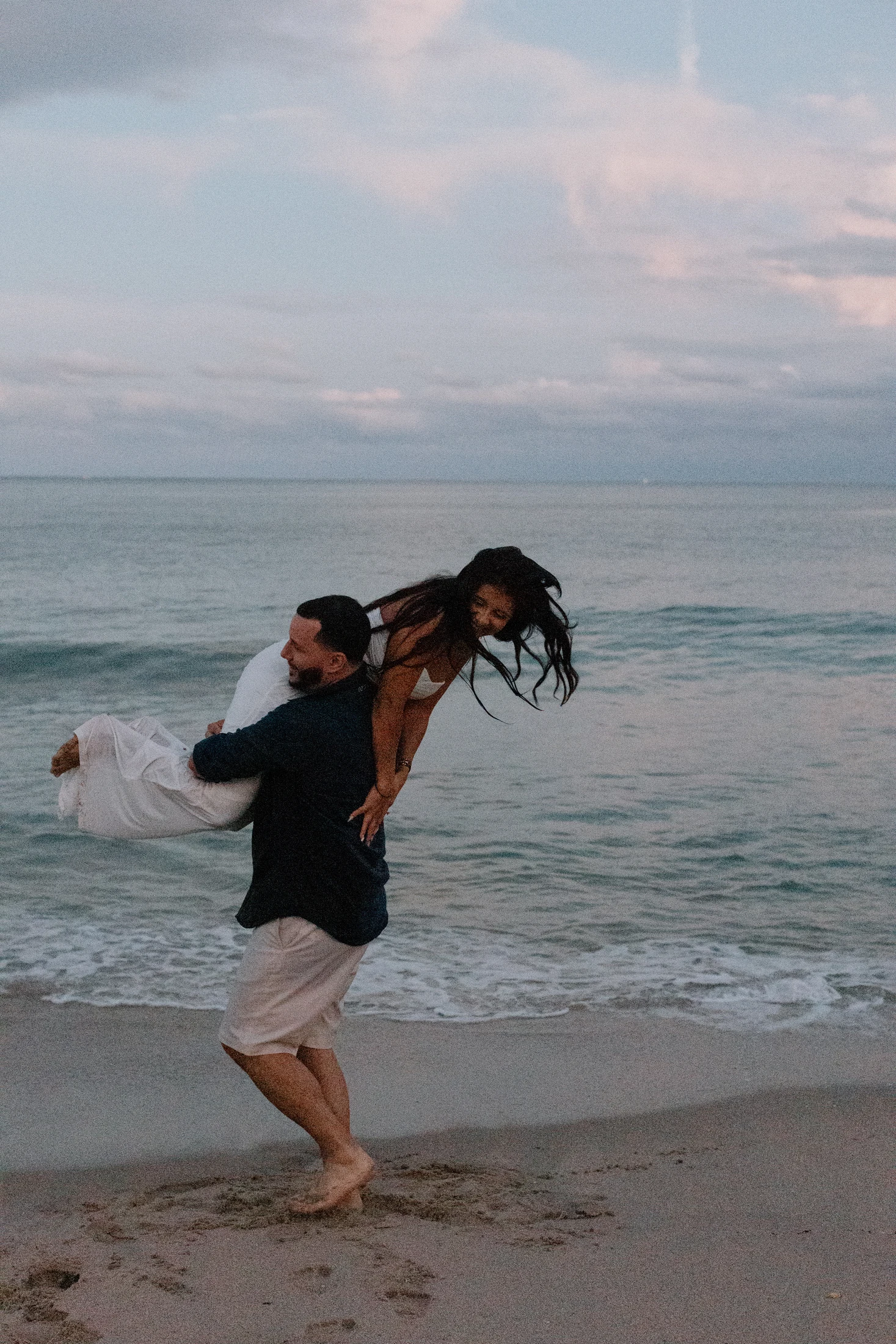 Francisco carrying Ginna